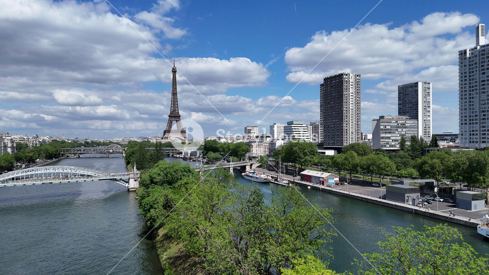 Paris Skyline At Paris In France Island France. Highrise Eiffel Tower. Downtown Cityscape. Paris Skyline At Paris In France Island France. Seine River Skyline. Metropolitan Region Aerial View.