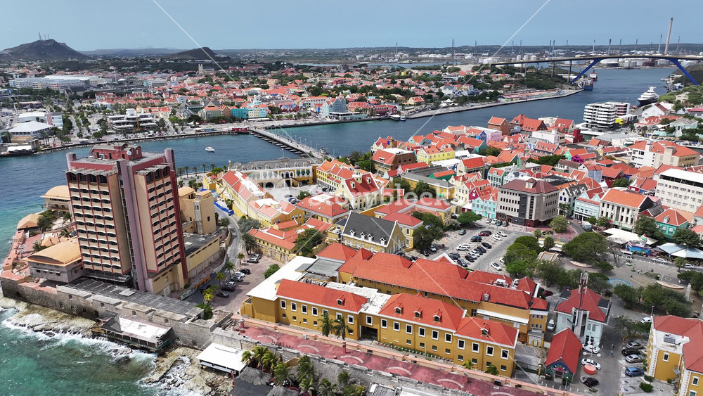 Curacao Skyline In Punda Willemstad Curacao. Amazing Skysrapers And Traffic On Street Viewed From Above. Coast Clouds Seaside Summertime. Coast Outdoors Beach Travel. Punda Willemstad.