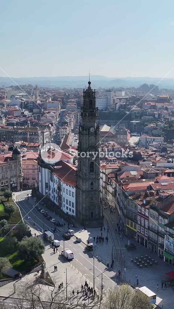 Porto, Portugal - 1.5.2026 - Clerigos Tower At Porto In District Of Porto Portugal. Sunny Day. Birds Eye View Of Medieval Building In Famous District Of City.