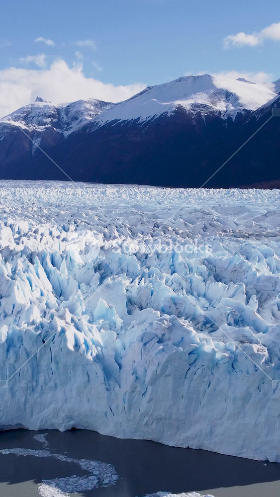 Los Glaciares National Park In El Calafate Santa Cruz Argentina. Stunning View Of Icebergs Breaking Off Into The Water . Snowy Tourism Patagonia Landscape Exploring.