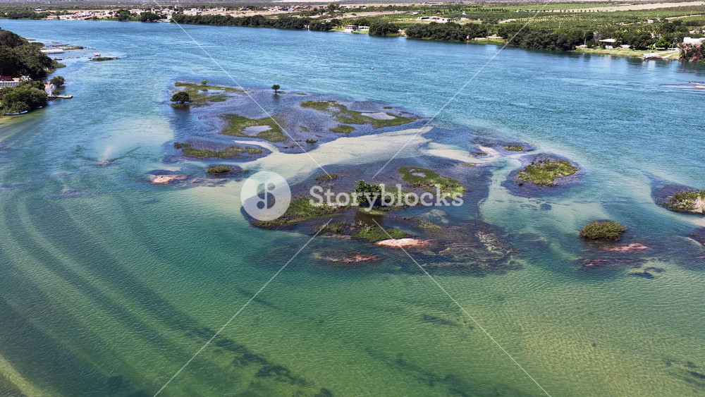 Sao Francisco River In Juazeiro Bahia Brazil. Aerial View Of A River Surrounded By Lush Green Tropical Rainforest. Tropical Eco Tourism. Rainforest Landscape. Juazeiro Bahia.