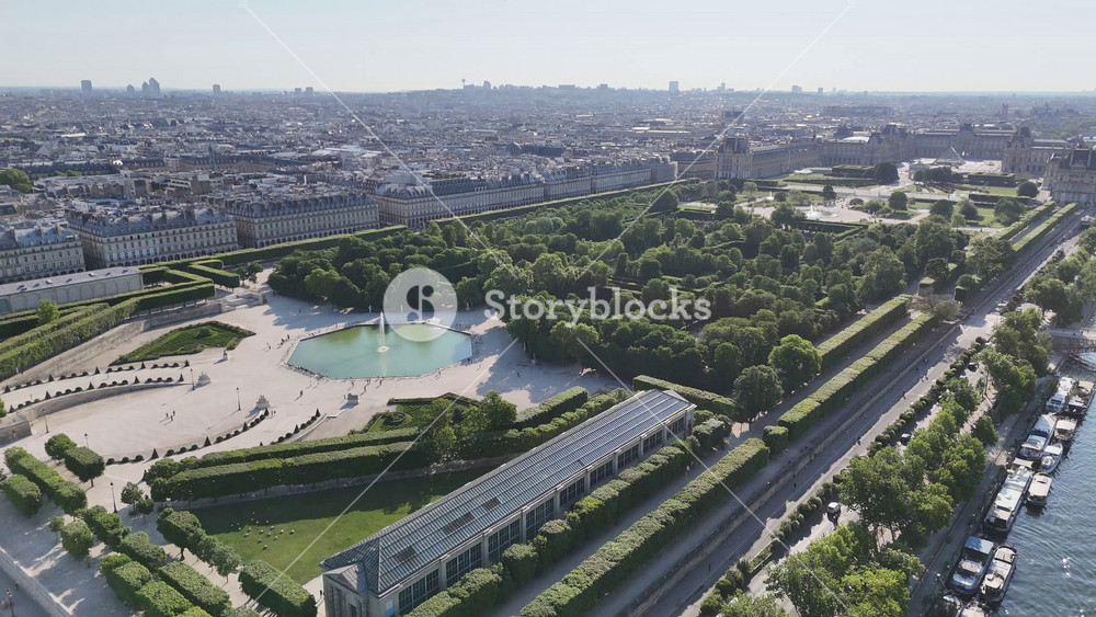 Tuileries Garden At Paris Ile De France In France. Beautiful Leisure Park. Paris Skyline Scene. Tuileries Garden At Paris In Ile De France France. Tuileries Fountain. Tourism Landmark.
