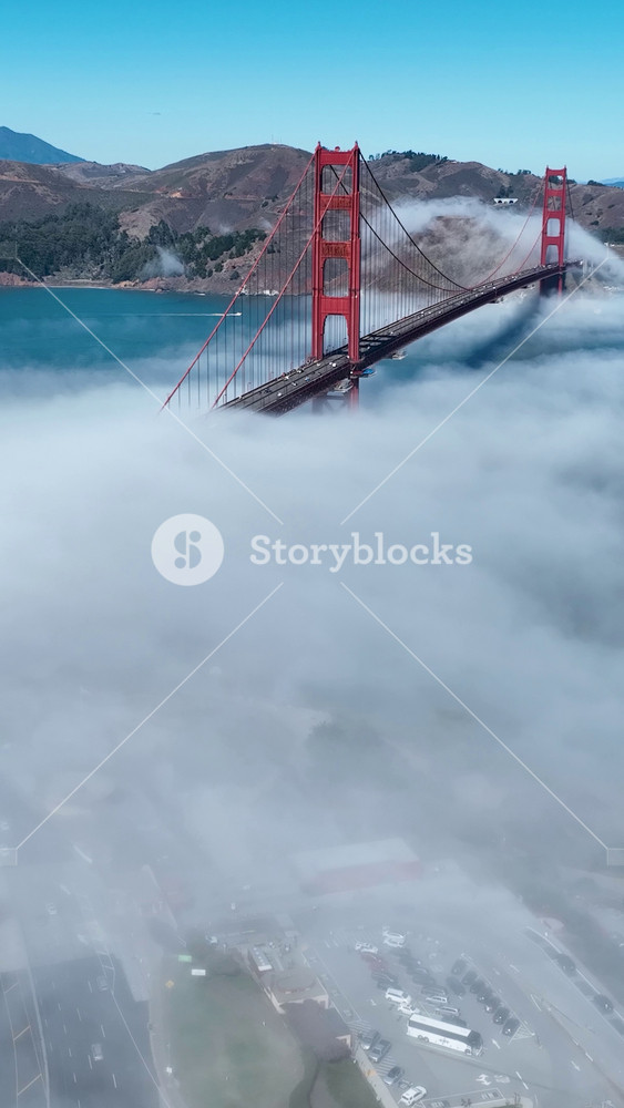Golden Gate Bridge In San Francisco California United States. Bridge Showcasing The Traffic Flowing Across In The City. Business Sky Clouds Downtown Cityscape. Outdoor Downtown Panning Wide.