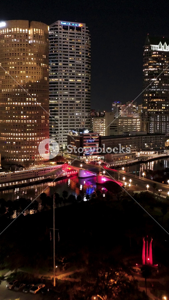 Tampa, Florida, United States - 1.5.2026 - Illuminated Downtown At Tampa In Florida United States. Night Skyline. Modern City Center With Skyscrapers Reflecting The Urban Life.