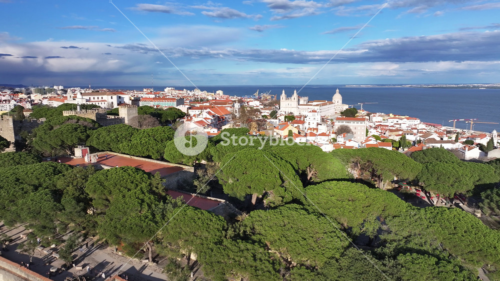 Sao Jorge Castle At Lisbon Lisbon District Portugal. Aerial View Of Landmark Medieval Building In Downtown Scene. Business Sky Downtown Cityscape. Outdoor Downtown Panoramic. Lisbon Lisbon District.