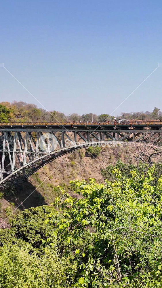 Zambia Zimbabwe Border In Livingstone Northern Rhodesia Zambia. Traffic Is Moving Across A Modern Cable-Stayed Bridge. Nature Sky Sky Forest. Sky Rural Horizon. Livingstone Northern Rhodesia.
