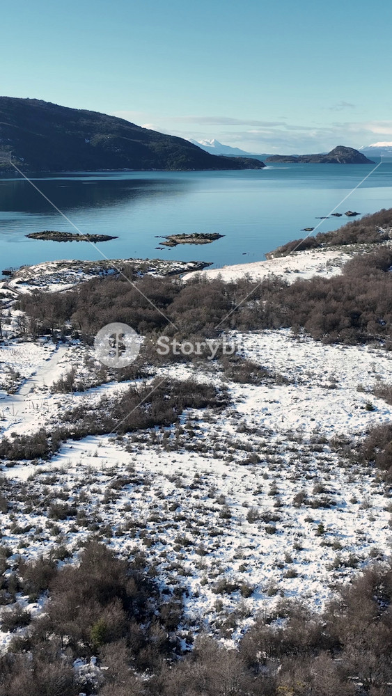 Country Road In Ushuaia End Of The World Argentina. Birds Eye View Of Peaceful Mountains Valley And Forest Trees. Nature Travel Destinations Snow Covered Forest Trees. Nature Aerial Landscape.