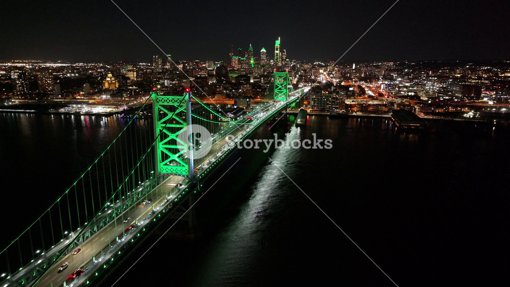Cable Bridge At Philadelphia In Pennsylvania United States. City At Night Scene. Illuminated Bridge Landscape. Cable Bridge At Pennsylvania United States. Benjamin Franklin Bridge.