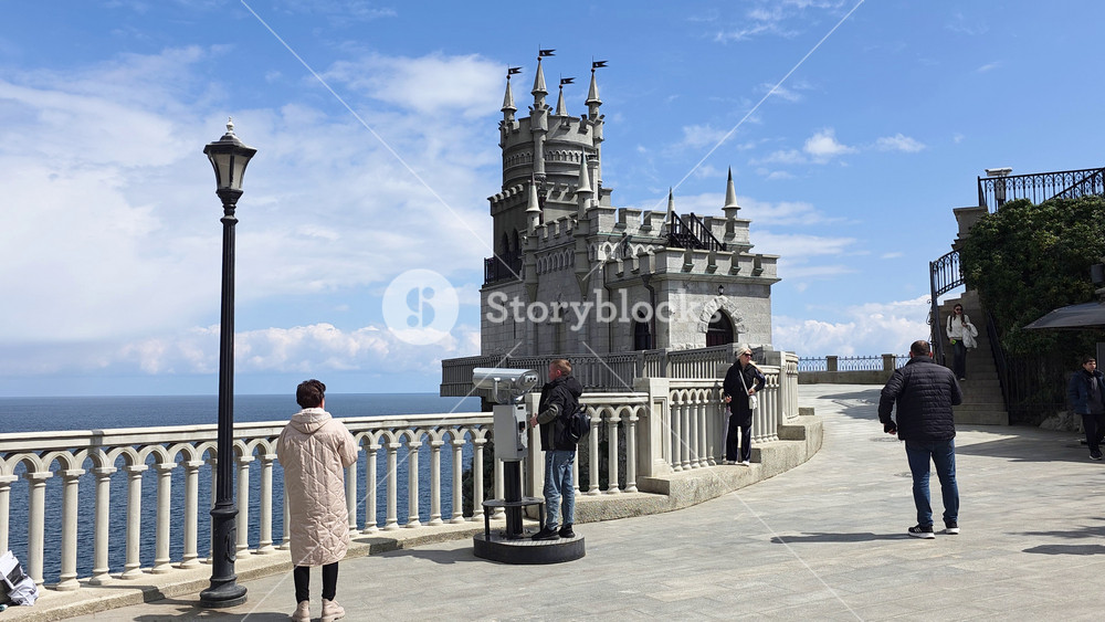 Yalta, Russia - April 20, 2026: Swallow's nest castle perching on aurora cliff, offering tourists panoramic views of black sea and embodying historical architecture and travel destinations in gaspra