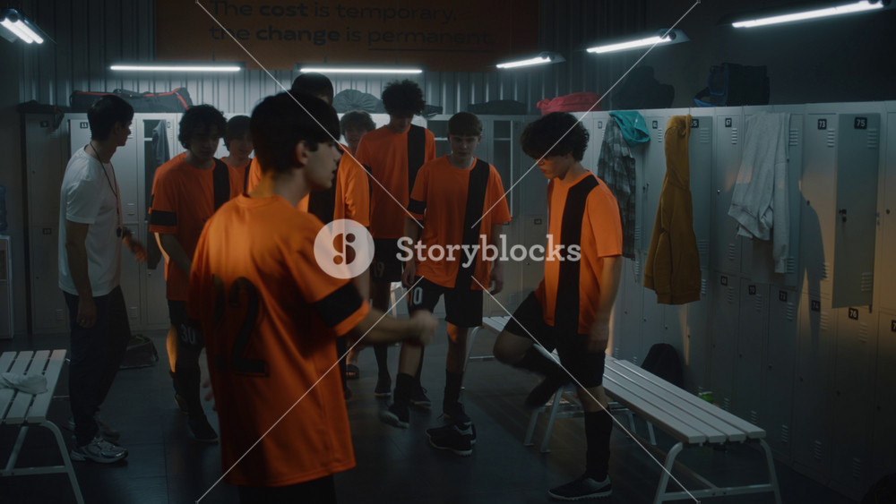 Group of Teenage Soccer Players Gathers in Locker Room after Practice to Capture Cheerful Team Selfie. Friendship, Teamwork, and Shared