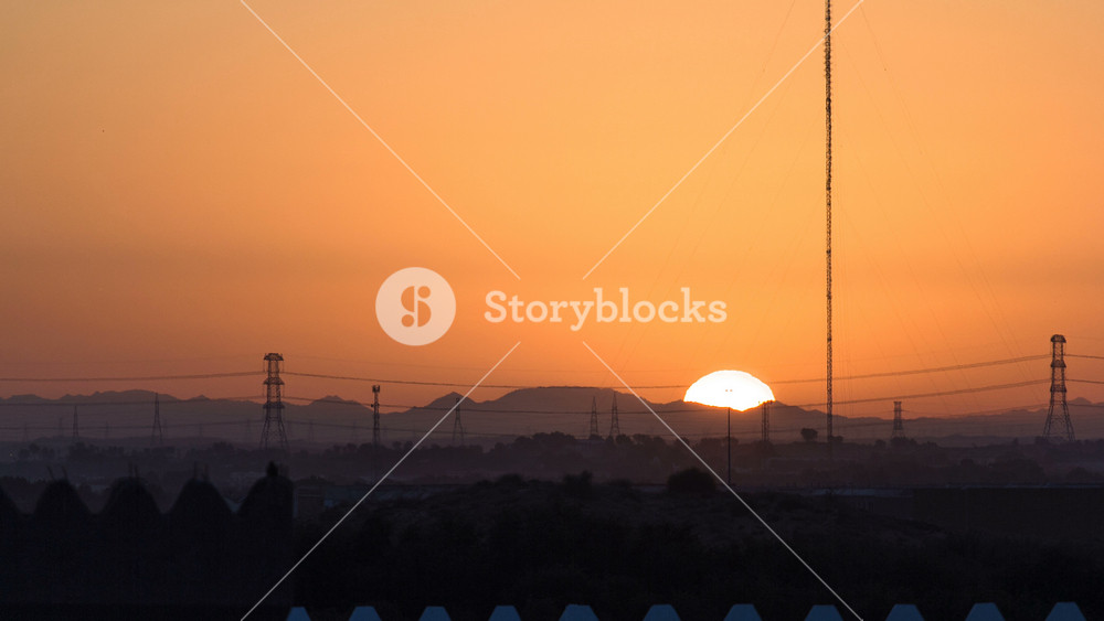 Sunset in Ajman from rooftop timelapse. Ajman is the capital of the emirate of Ajman in the United Arab Emirates.