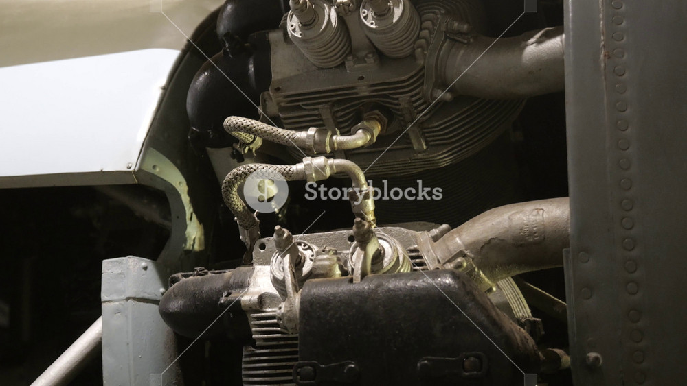 world war two aircraft radial engine national war museum exposed cylinders fuel lines oil hoses museum display valletta malta military aviation history restored aviation exhibit mechanical detail