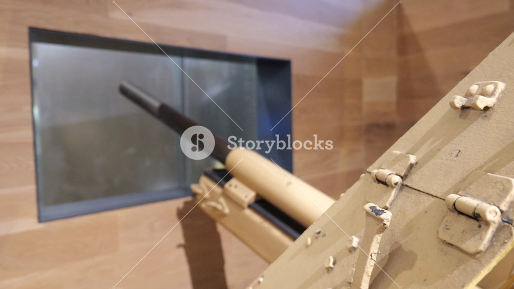 german 3.7cm pak 35 36 anti tank gun national war museum gun shield barrel desert camouflage glass display case valletta malta world war two artillery exhibit wheeled carriage rubber tires