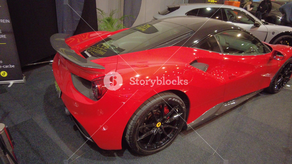 red ferrari brussels auto show 2024 motor event exhibition panning shot italian 296 f8 pista spider gtb 488 expensive rich spectacle