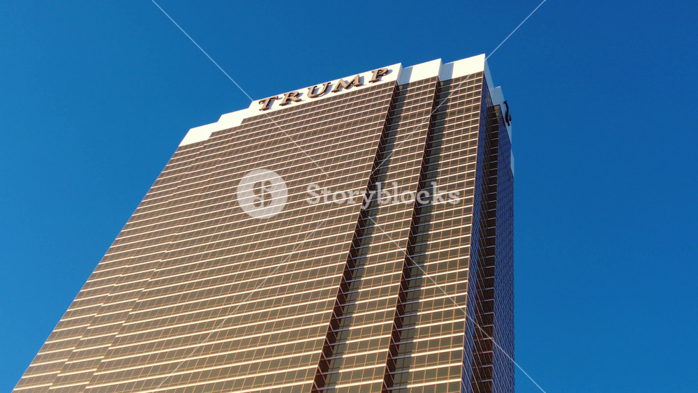 trump international hotel las vegas top to bottom sign golden facade exterior close up fabulous city tourism gamble gambling casino resort