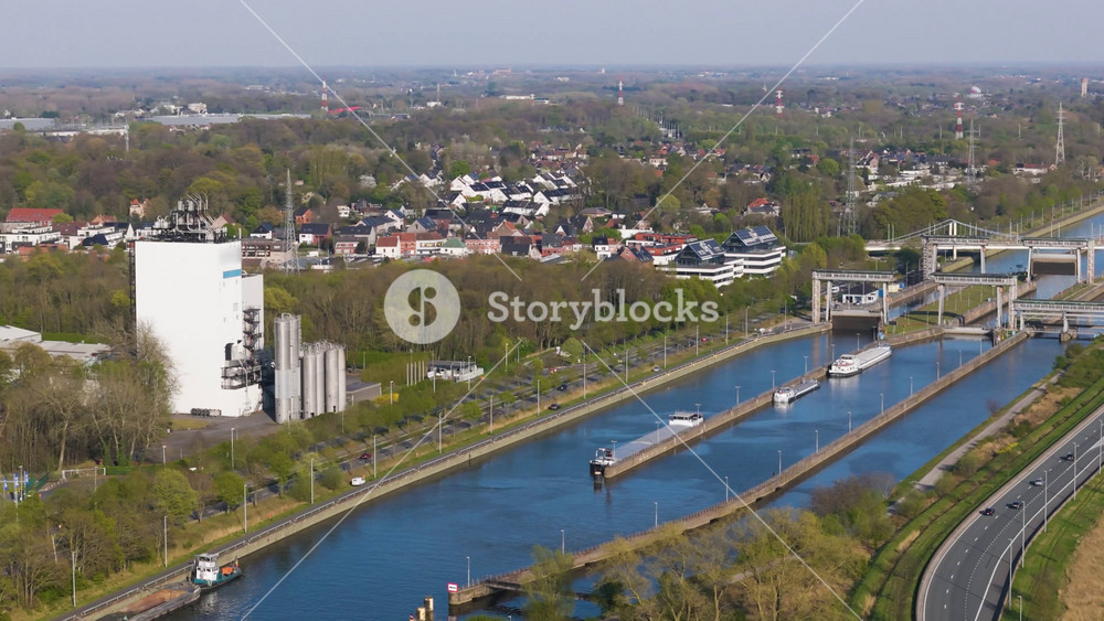 football stadium ghent aerial view modern urban planning cable stayed bridge office towers sponsor branding belgium urban development project modern infrastructure Flemish region Belgian skyline