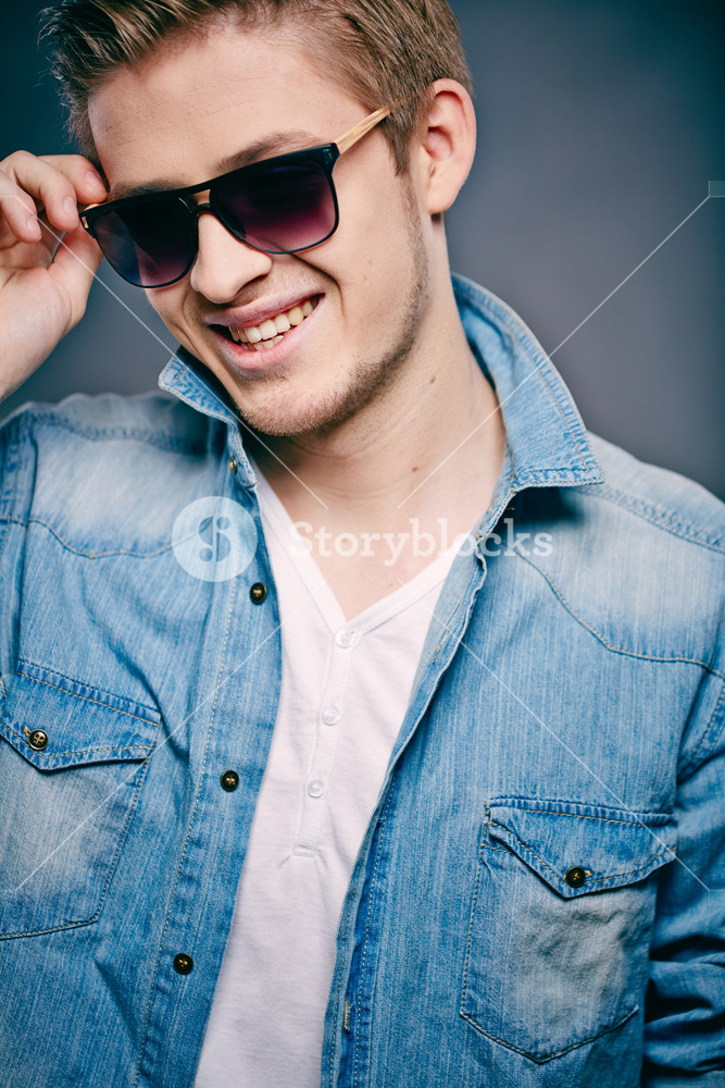 A Young Person in Sunglasses Posing for the Camera Royalty-Free Stock ...
