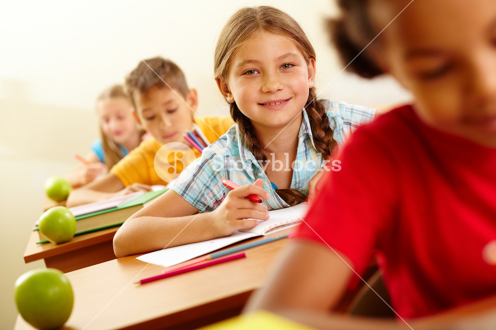 Portrait Of Girl Drawing In Copybook At Lesson Royalty-Free Stock Photo ...