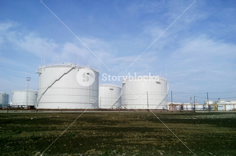 Refinery Tank Shell Storage tanks for petroleum products. equipment refinery. Royalty-Free ...
