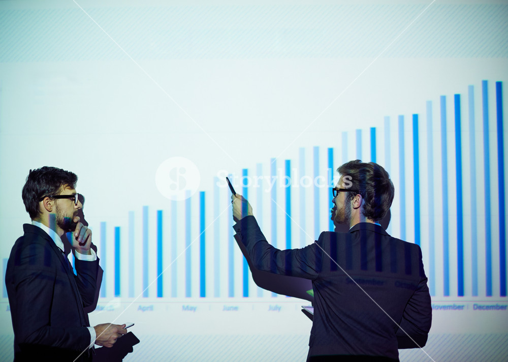 Man Reporting Businessman Presenting Financial Report On The Wall Royalty-Free Stock ...