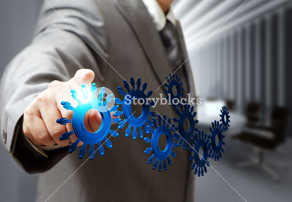 Business Man Hand Point Cogs Icons In Board Room Royalty-Free Stock ...