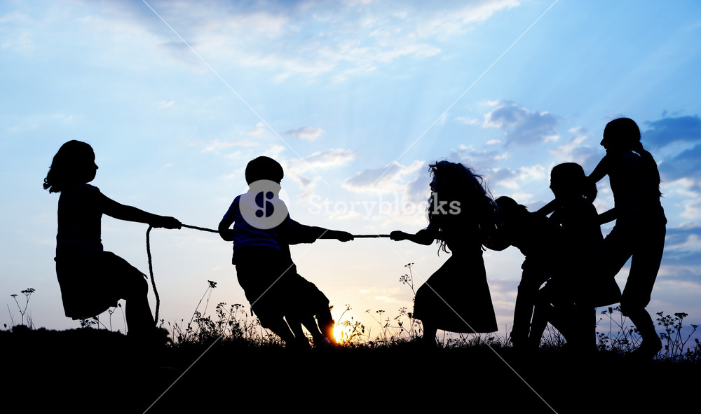 Joyful kids enjoying a sunny summer day Royalty-Free Stock Photo SBI ...