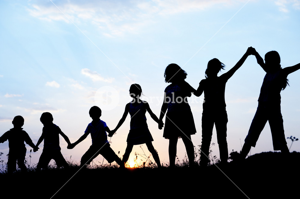 Joyful kids enjoying a sunny summer day Royalty-Free Stock Photo SBI ...