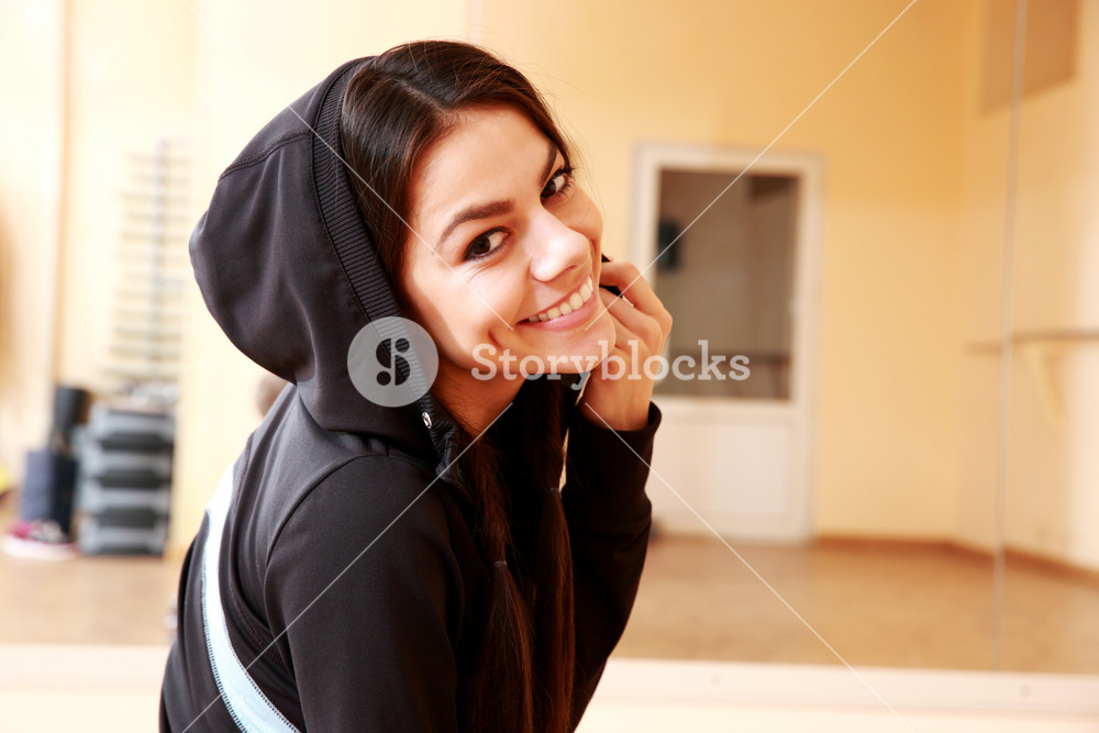 Portrait of a young joyful woman at the gym Royalty-Free Stock Photo ...