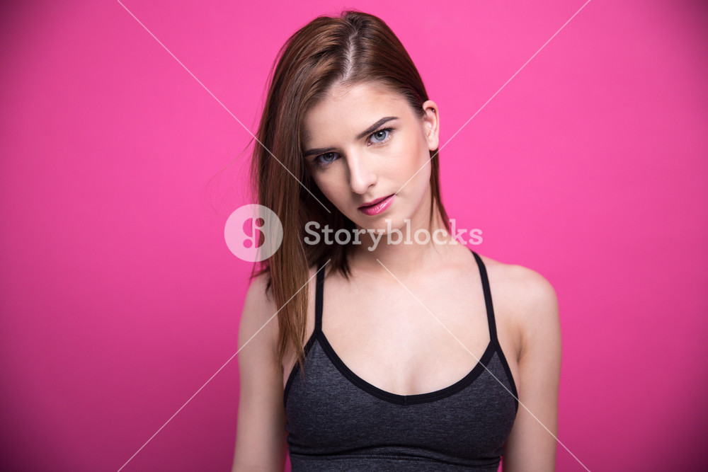 Portrait of a beautiful woman on a pink background Royalty-Free Stock ...