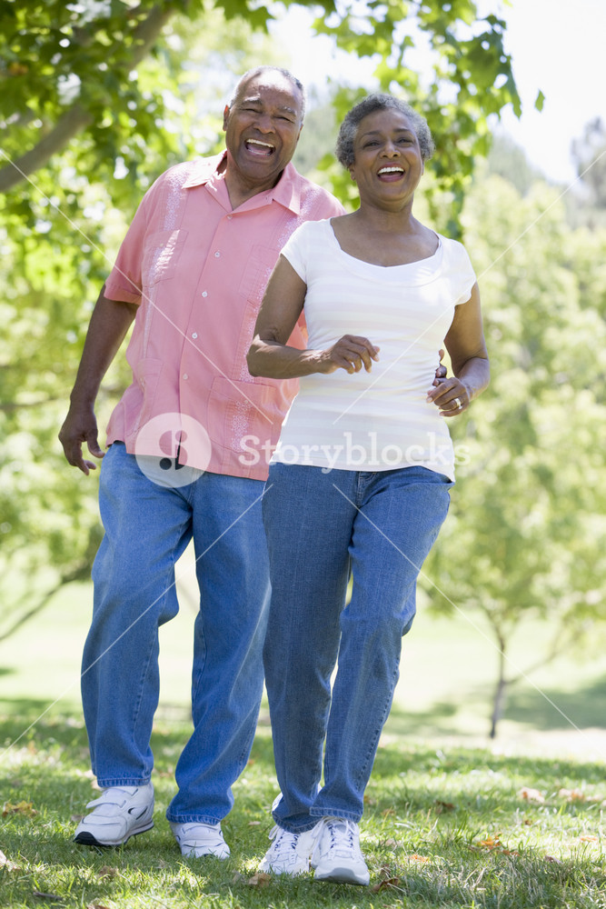 Senior couple having fun in park Royalty-Free Stock Photo SBI-301026708 ...