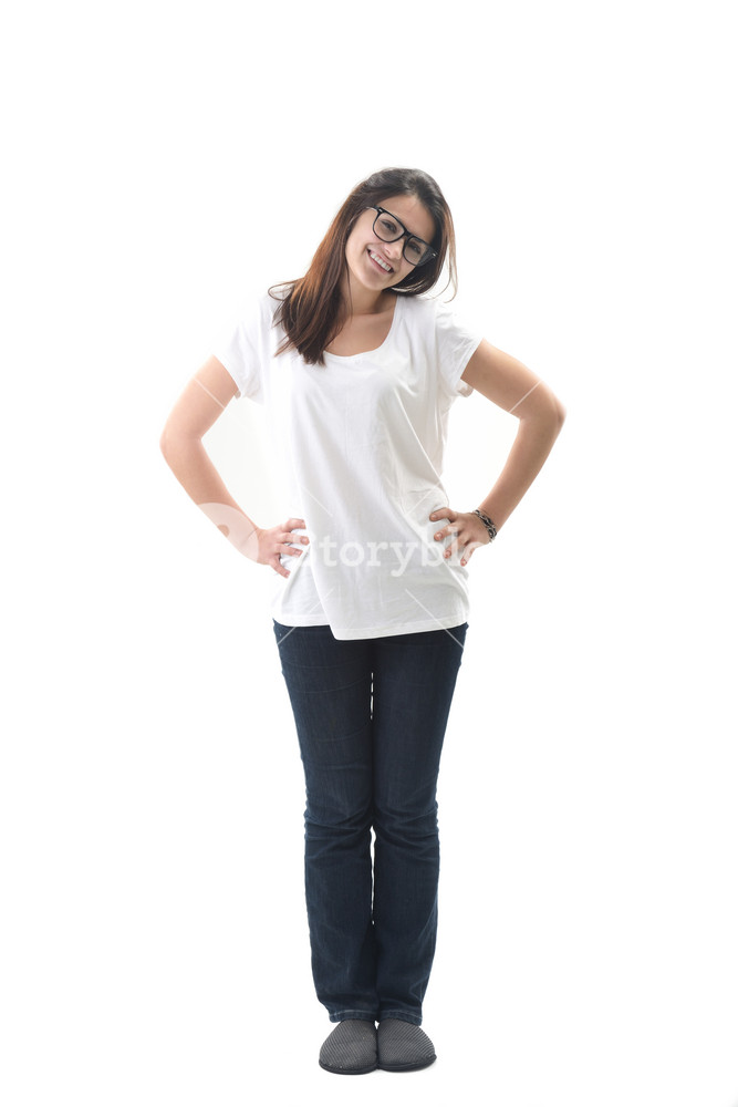 Smiling young woman posing on white background Royalty-Free Stock Photo ...