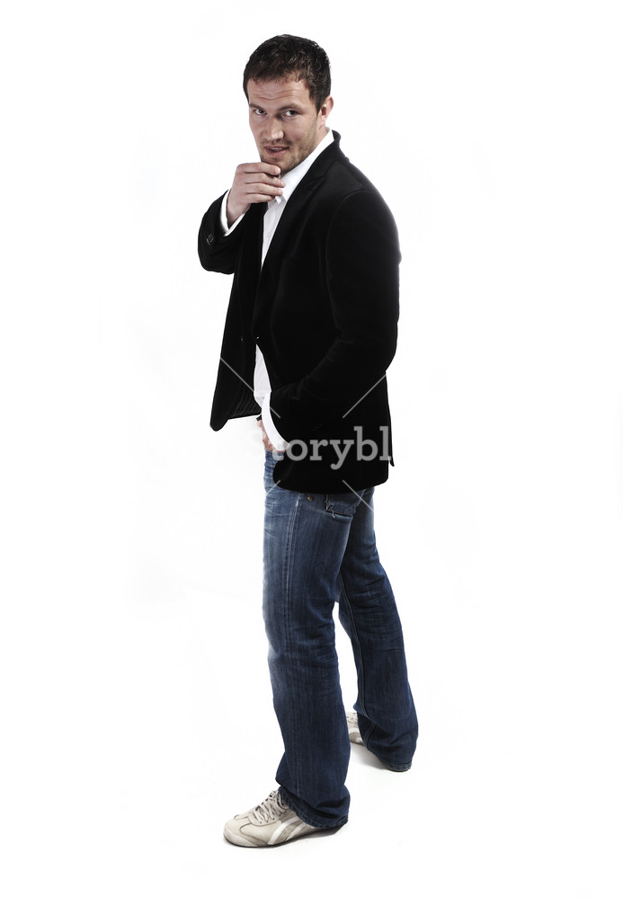 Young man in casual attire on a white background Royalty-Free Stock ...