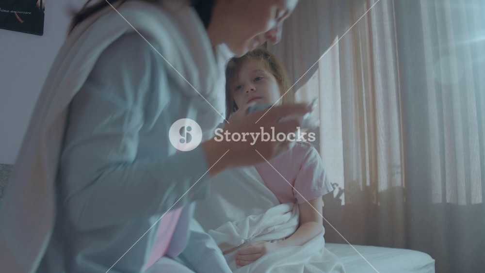 Loving mother with letter S on her chest and superhero cape is holding medicine to treat the sickness of her child. Mom and sick daughter