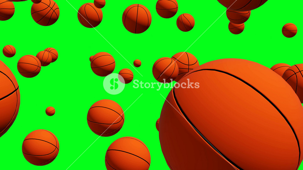 Basketball balls rain falling on green screen or chroma key. Background formed by closeup of many orange balls with zoom. Used for Sport, play, basquet, match, championship, stadium, competition,team