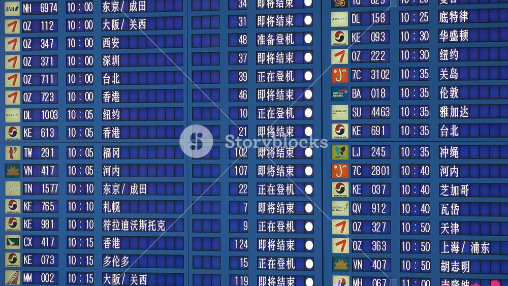 SEOUL, SOUTH KOREA SEPTEMBER 2015: Electronic schedule board displaying flight departure information in Korean, English, Chinese, and Japanese, at Incheon International Airport in Seoul, South Korea