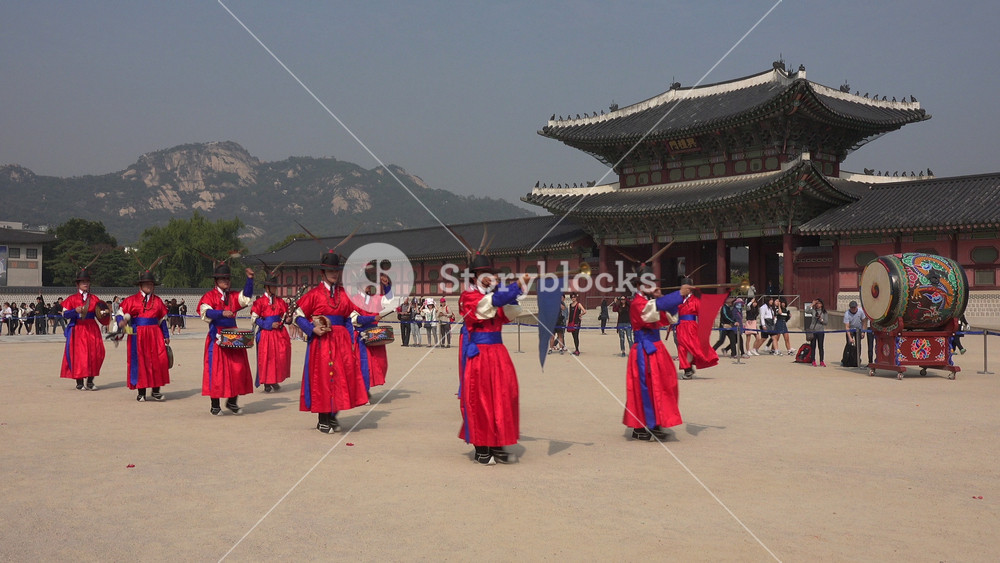 SEOUL, SOUTH KOREA SEPTEMBER 2015: Colorfully dressed traditional brass band playing music at a changing of the guards ceremony in Seoul, South Korea
