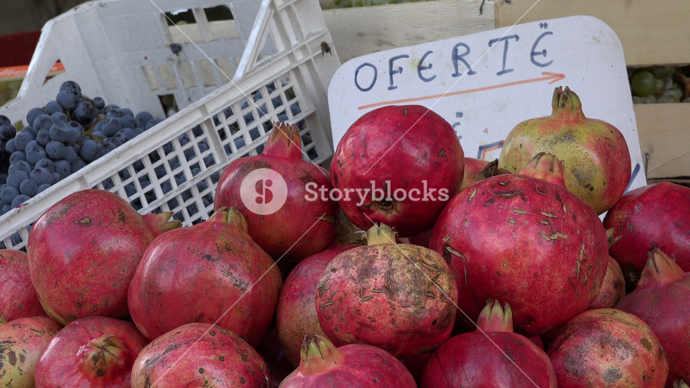 TIRANA, ALBANIA OCTOBER 2017: Pomegranate and other fruits for sale at grocery shop in Tirana, food and economy in Albania