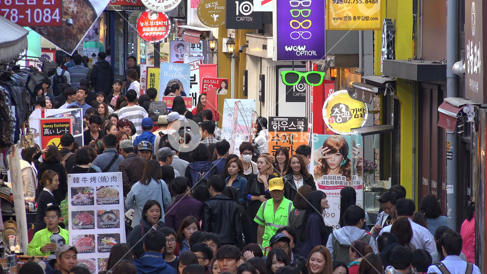SEOUL, SOUTH KOREA SEPTEMBER 2015: Popular shopping district, pedestrians walk through a crowded street, consumers and economy, South Koreas capital city Seoul