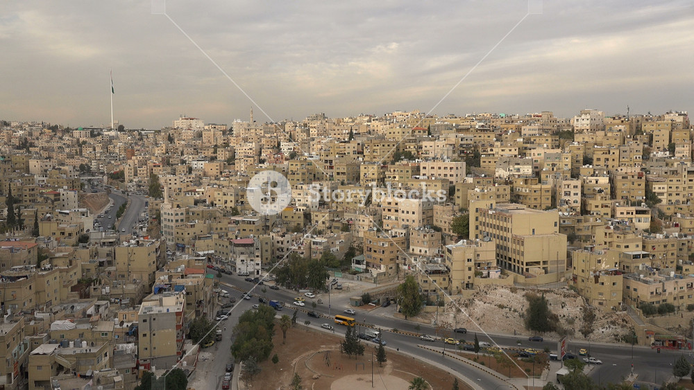 AMMAN, JORDAN NOVEMBER 2016: Panoramic overview of residential neighborhoods built on hilltops in central Amman, capital city of Jordan
