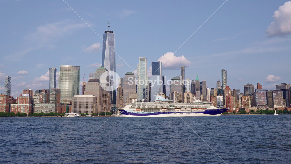 New York, USA - June 16, 2023: Cruise ship Carnival Venezia Sailing next to Manhattan in New York. Skyline of New York Manhattan cruising on