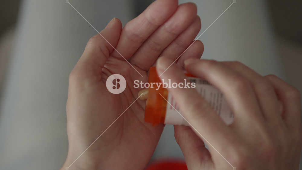 Medication Tablets, Capsules From Medicine Bottle. Antidepressant Headache Soporific Antibiotic. Medical Insurance Medicare. Vitamins And Supplements. Pouring Pills From Prescription Medicine Bottle.