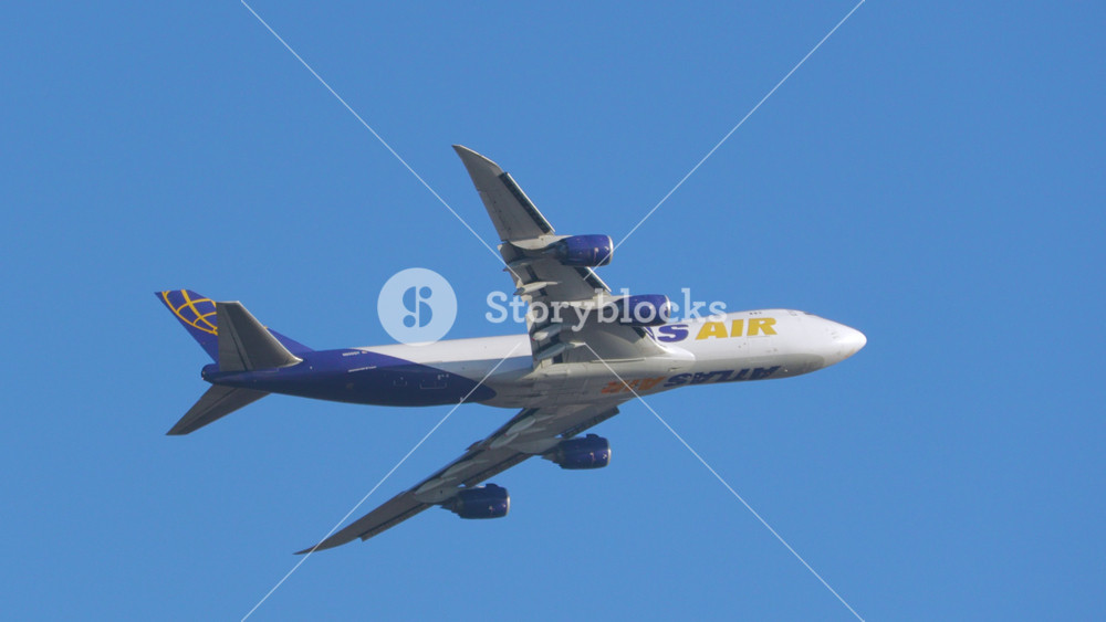 Atlas Air Airlines Airplane Takeoff and Climb. Passenger Aircraft Departure from International Airport. Side View Airplane Flying . Passenger Aircraft take off. Greer, SC, USA - December 6, 2025.