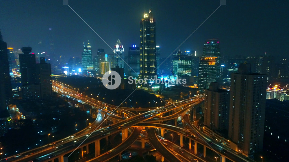 Shanghai, China - May 28, 2018: Aerial view of busy traffic and skyscrapers. Shanghai is the largest city by population in China.