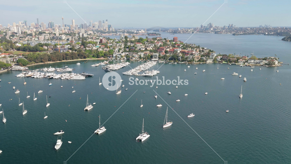 Aerial drone view of the harbour side suburb of Point Piper in East Sydney, NSW, Australia on a sunny morning in September 2024 looking from the east side above the marina