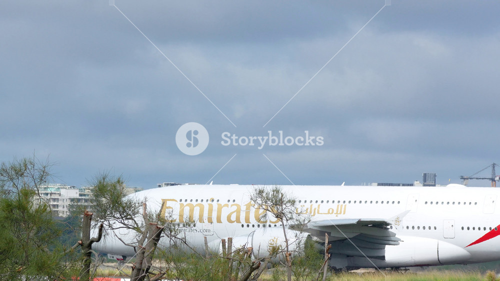 An Emirates Airbus A380-842 airline plane, the world's largest passenger aircraft, taxiing to Runway 34L at Sydney Kingsford Smith Airport in November 2025